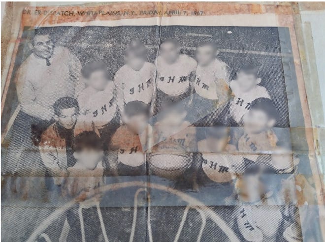 Edwin Gaynor and his basketball team at Immaculate Heart of Mary in Scarsdale in 1967. Standing in front of Gaynor is Gregory Morra, one of 21 former students who allege in lawsuits that Gaynor sexually abused them