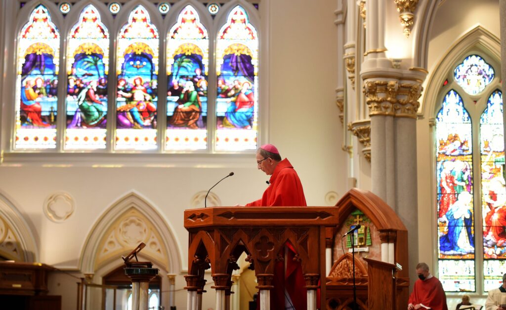 Erie Catholic Bishop Lawrence Persico leads a Good Friday service on April 2 at St. Peter Cathedral in Erie, the mother church of the 13-county Catholic Diocese of Erie. Jack Hanrahan / Erie Times-News