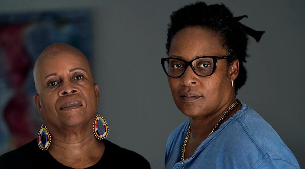 Gloria Webster, left, who is retired and lives in Raleigh, N.C., and her daughter Angelique Webster, of Worcester, Mass., an independent filmmaker, stand together for a photograph, Thursday, Sept. 7, 2023, at Angelique’s home, in Worcester, Mass. Black victims have largely been invisible in the Catholic sexual abuse crisis, including Baltimore, where Angelique was abused by their parish priest. Gloria fought hard for justice. The priest was later convicted and defrocked. The family settled with the archdiocese in 1993. (AP Photo / Steven Senne)