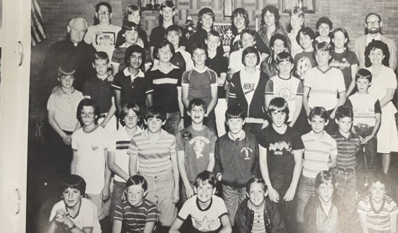 Michael Stano, lower left, during his time as an altar boy at Notre Dame Catholic Church in Denver. Monsignor Richard Hiester is on the left. Credit: Courtesy of Michael Stano