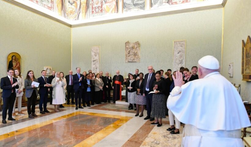 Pope Francis greets members of the Pontifical Commission for the Protection of Minors, in Rome for their plenary assembly, during a meeting at the Vatican March 7, 2024. (CNS photo/Vatican Media)