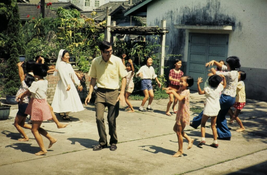 Fr. Jim Chevedden with parishioners in Taiwan in about 1975.