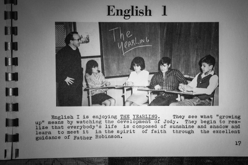 The Rev. Edmund J. Robinson SJ is seen in a St. Paul yearbook teaching an English 1 class. Warren Morin, who lives on the Fort Belknap Indian Reservation and whose grandfather attended the school, has collected its yearbooks. (Salwan Georges/The Washington Post)