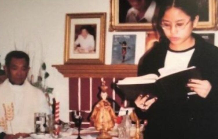 Aimee Torres, pictured in 1999, reads during a Mass celebrated by Fr. Honesto Bayranta Bismonte in her family's home. In 2002, Bismonte was arrested and charged with sexually molesting two young girls, including Torres. He pleaded guilty to misdemeanor battery and was sentenced to two years of informal probation in Los Angeles and was removed from active ministry. (Courtesy of Aimee Torres)